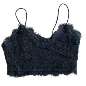 no brand black lace top size S with zipper on the the side